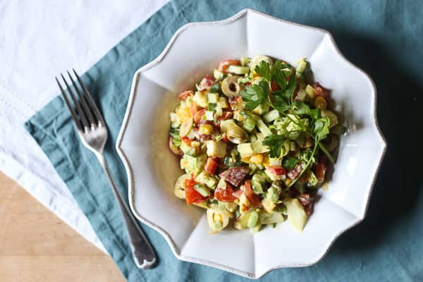 A bowl of salad with a fork