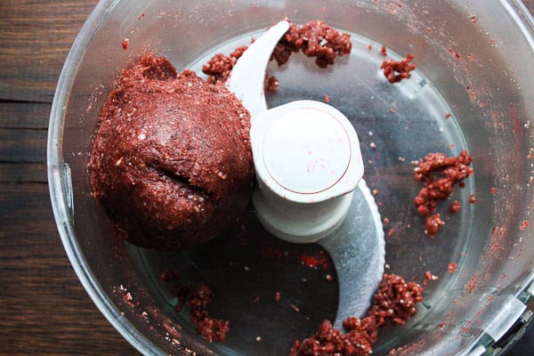 Raw Cranberry and Nut Energy Bar dough in a food processor