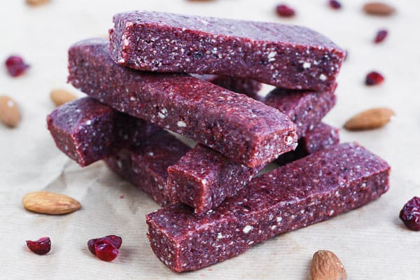 Raw Cranberry and Nut Energy Bars on baking parchment