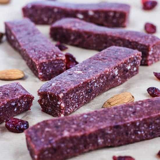 Raw Cranberry and Nut Energy Bars on baking parchment