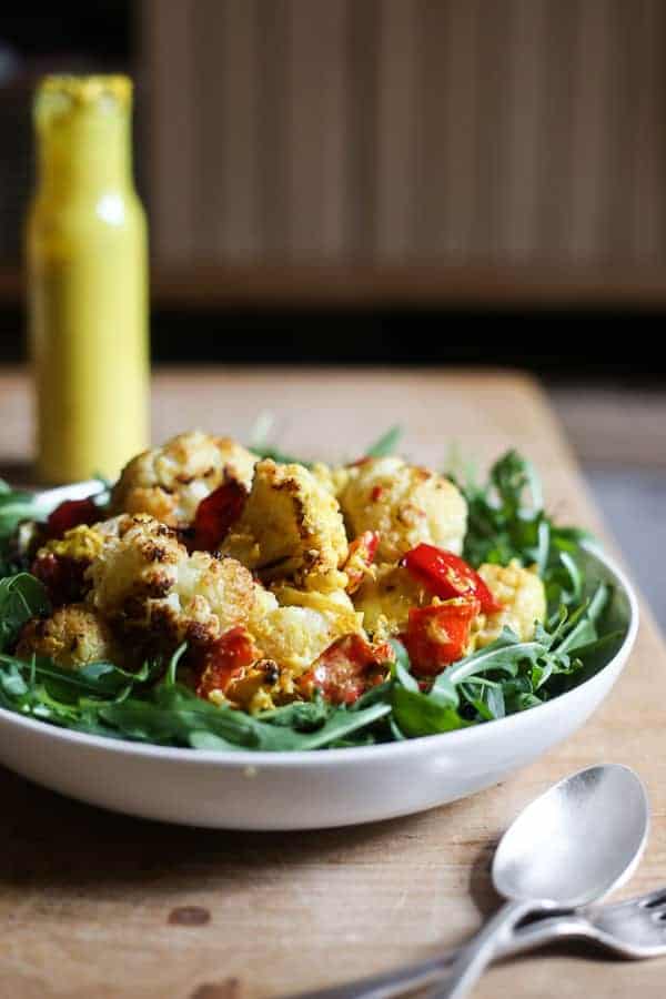 A bowl of cauliflower salad on a table