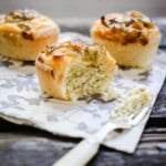 Gooseberry Friands with a forkful taken out showing soft and tender crumb.