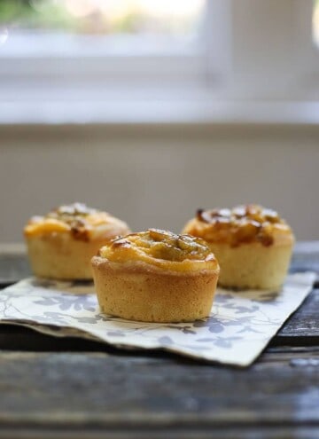 gooseberry friands on a napkin on a wooden table