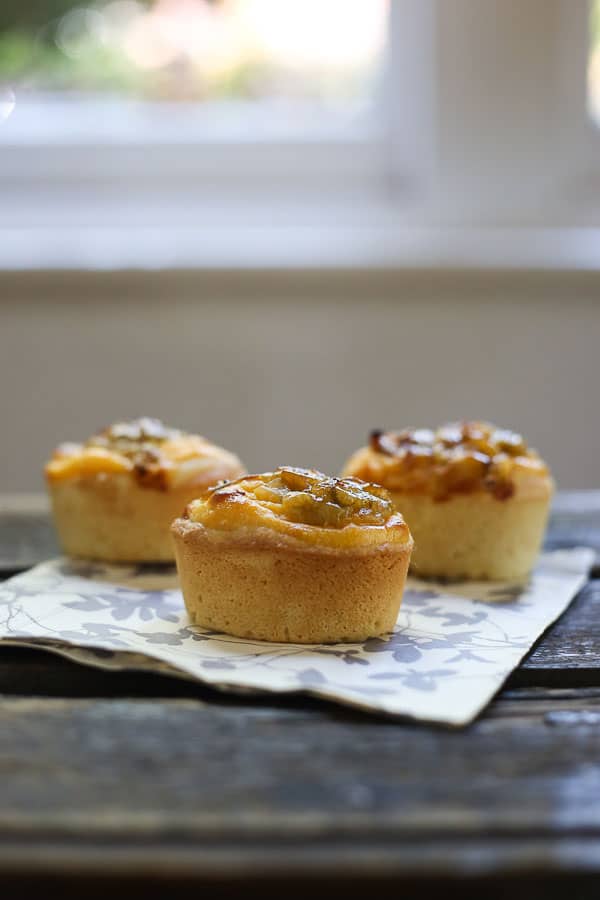 gooseberry friands on a napkin on a wooden table