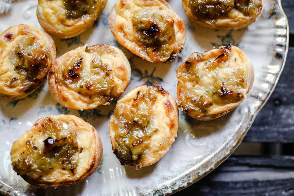 Gooseberry Friands topped with custard and a fresh gooseberry jam.