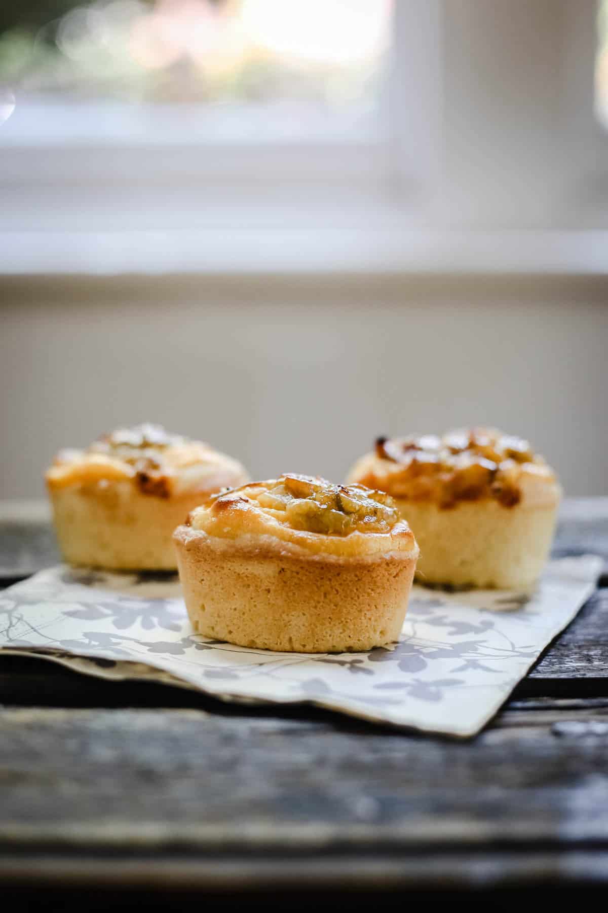 Gooseberry Friands topped with custard and a fresh gooseberry jam.