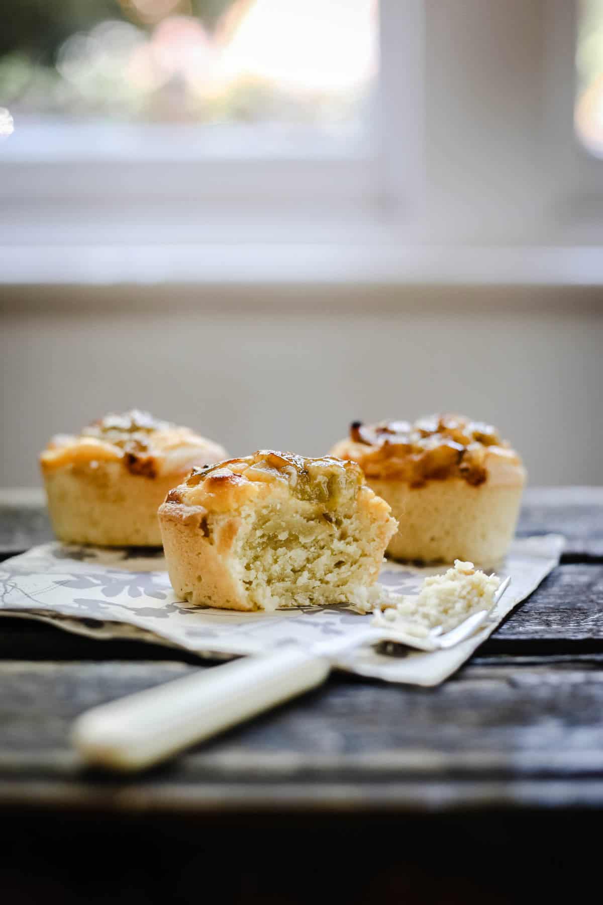 Gooseberry friands cut into showing soft and tender crumb.