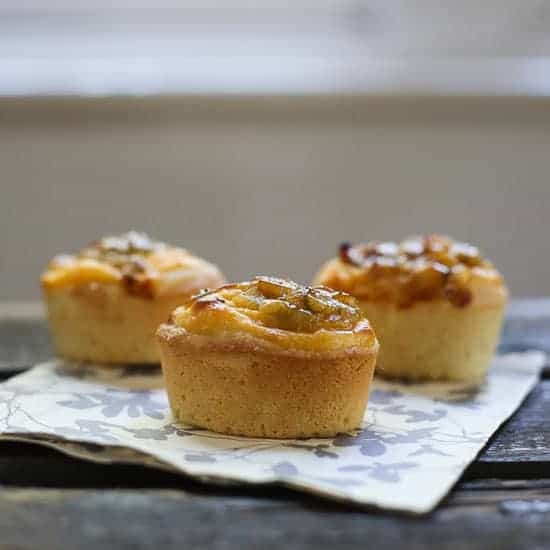 gooseberry friands on a napkin on a wooden table