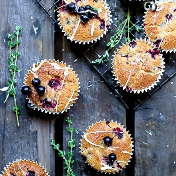 Blackcurrant White Chocolate and Thyme Muffins {gluten-free} overhead of Blackcurrant White Chocolate and Thyme Muffins on a wooden table
