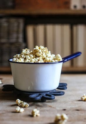 Buttered Maple and Bacon Salt Popcorn in a saucepan on a table
