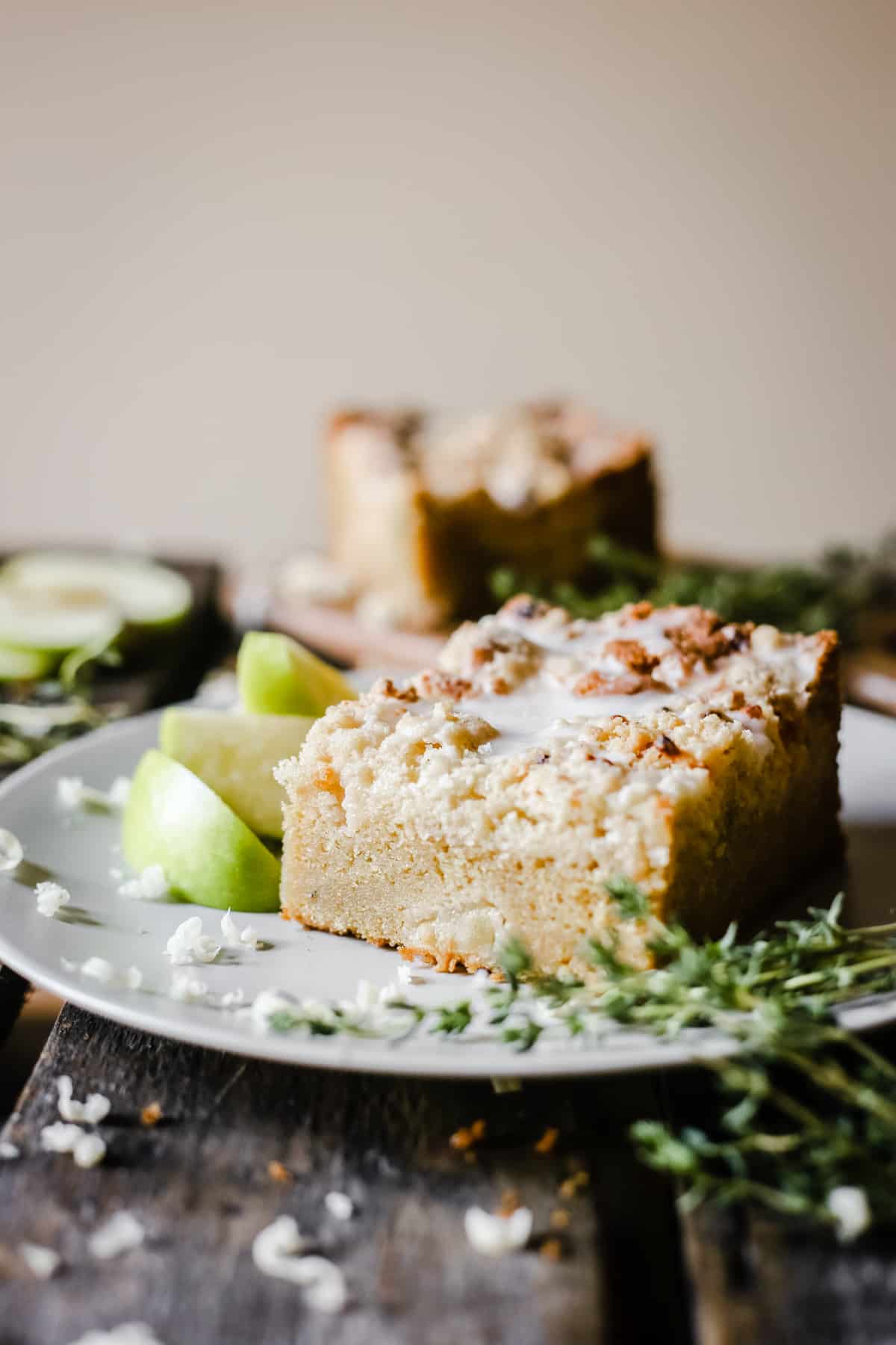 Apple Cheddar Thyme Crumble Cake on a plate