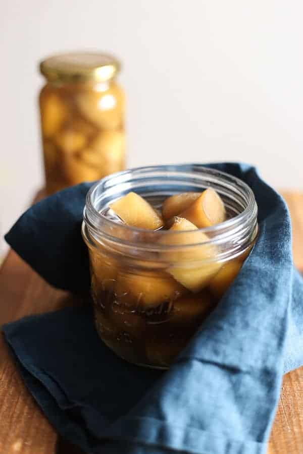 An open jar of Homemade Stem Ginger in Syrup