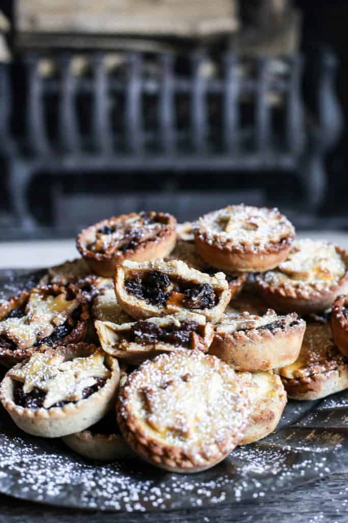 Gluten-Free Mince Pies on a tray in front of the fire