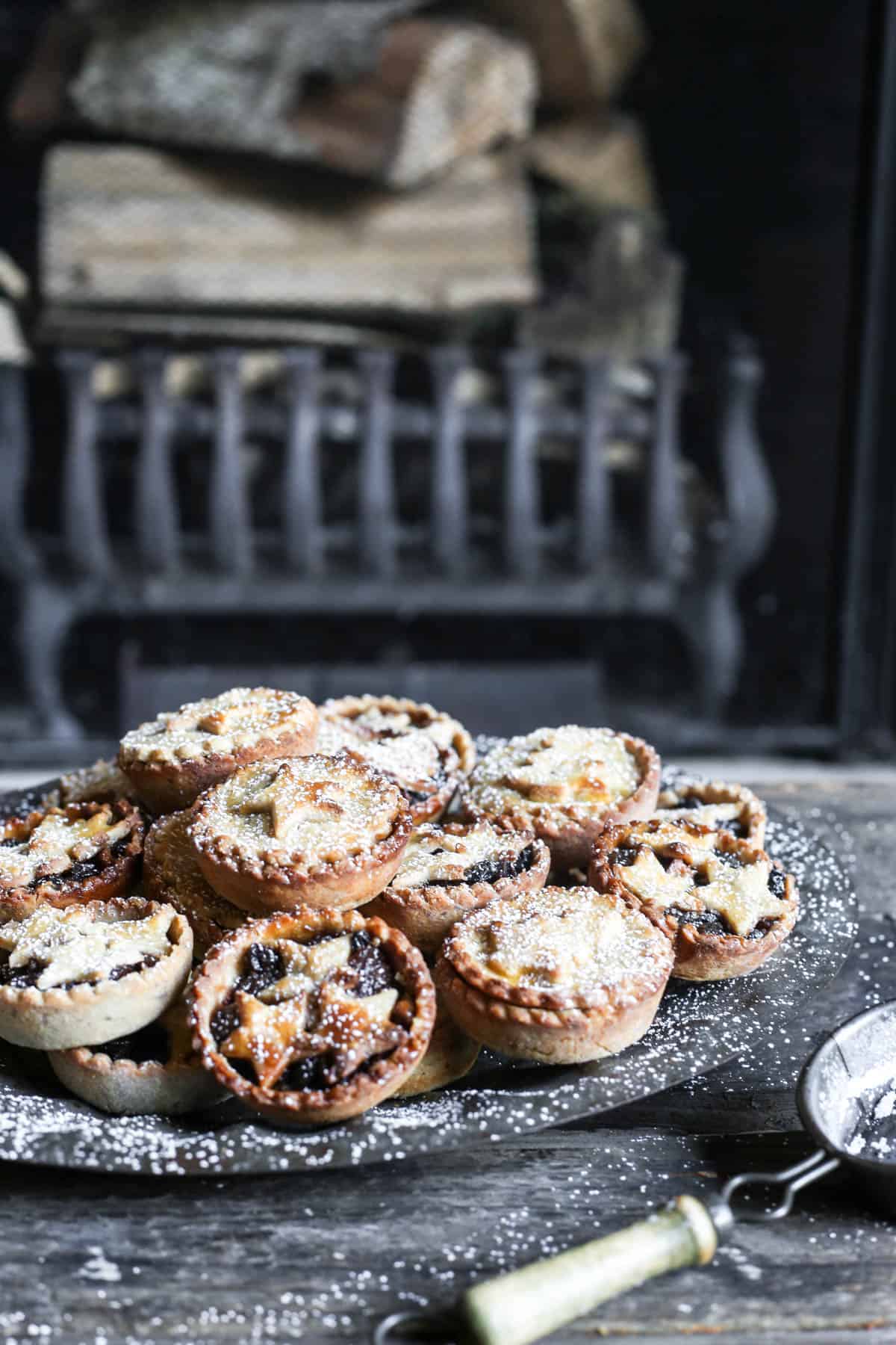 Gluten-Free Mince Pies on a tray in front of the fire