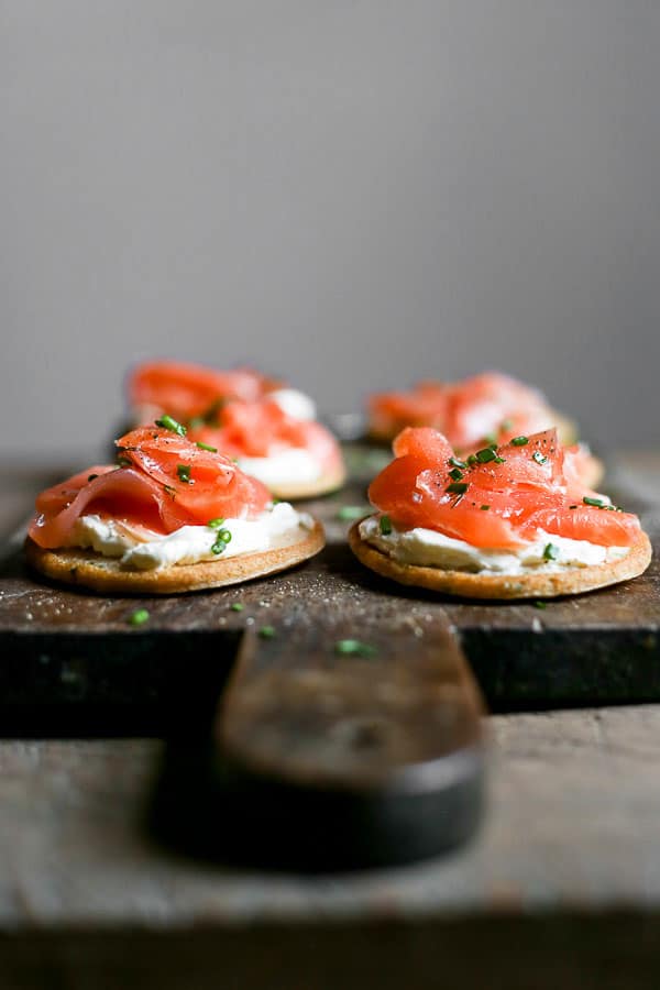 side view of Smoked Salmon on Potato Pancakes with Whipped Cream Cheese