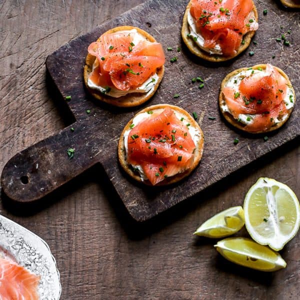 Smoked Salmon on Potato Pancakes with Whipped Cream Cheese overhead view of Smoked Salmon on Potato Pancakes with Whipped Cream Cheese