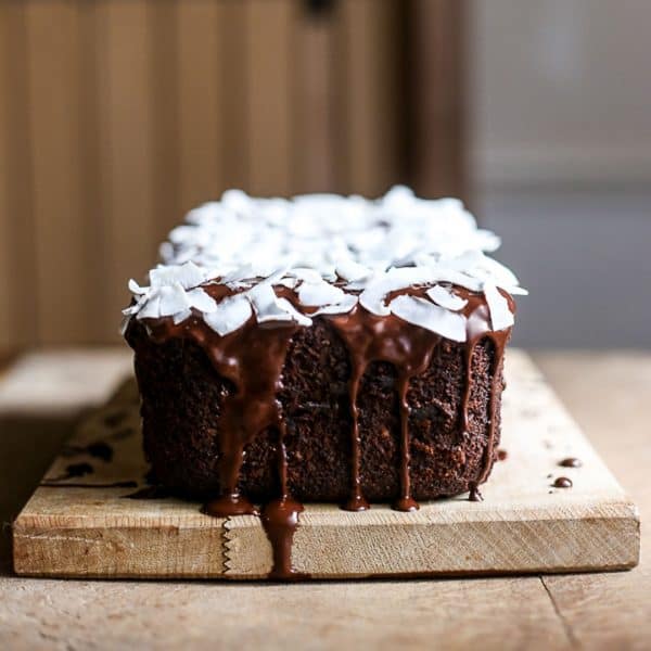 Vegan Chocolate Coconut Banana Loaf on a wooden board