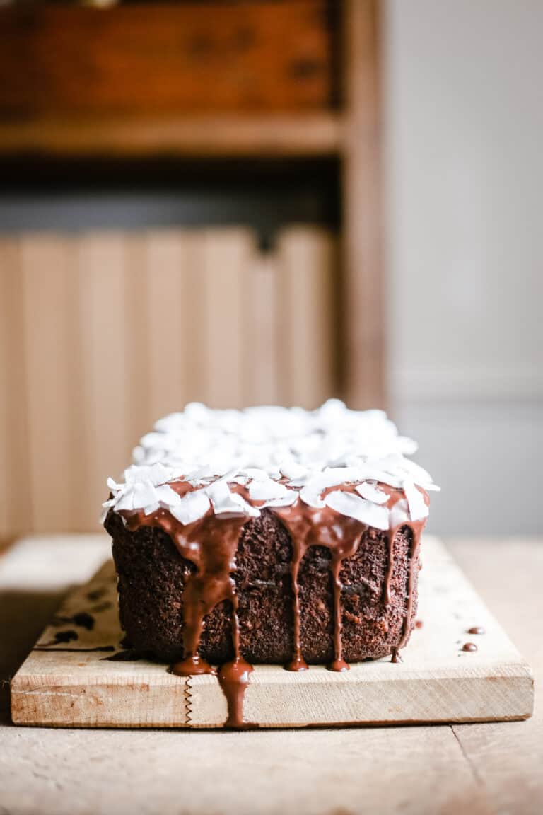 Vegan Chocolate Coconut Banana Bread on a wooden board