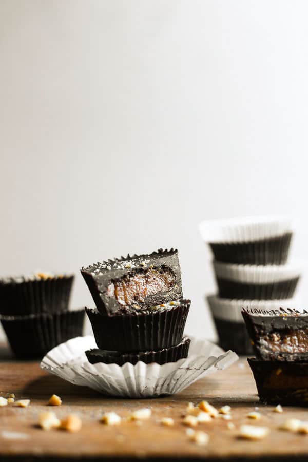 stacks of Chocolate Peanut Butter Caramel Crunch Cups 