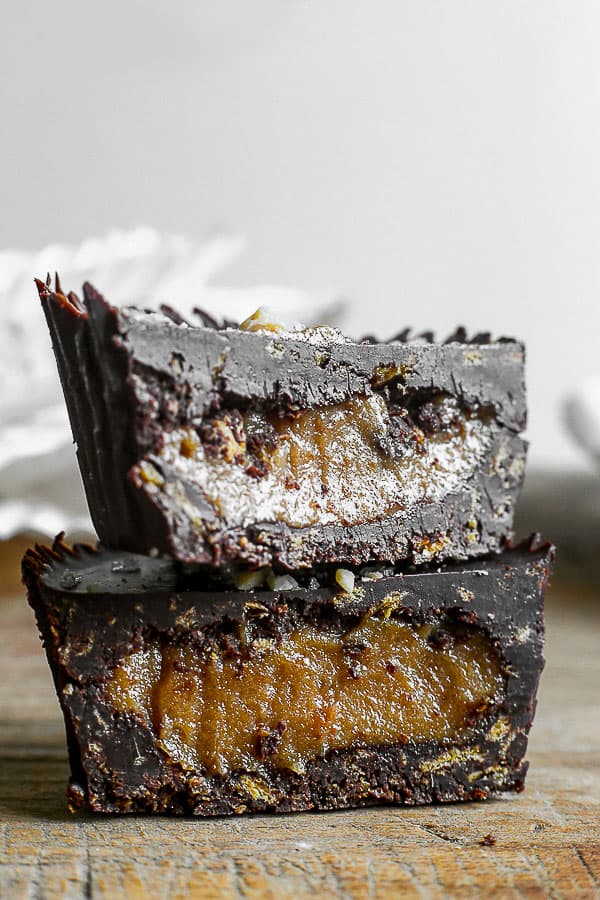 Chocolate Peanut Butter Caramel Crunch Cup cut in half and stacked up on each other