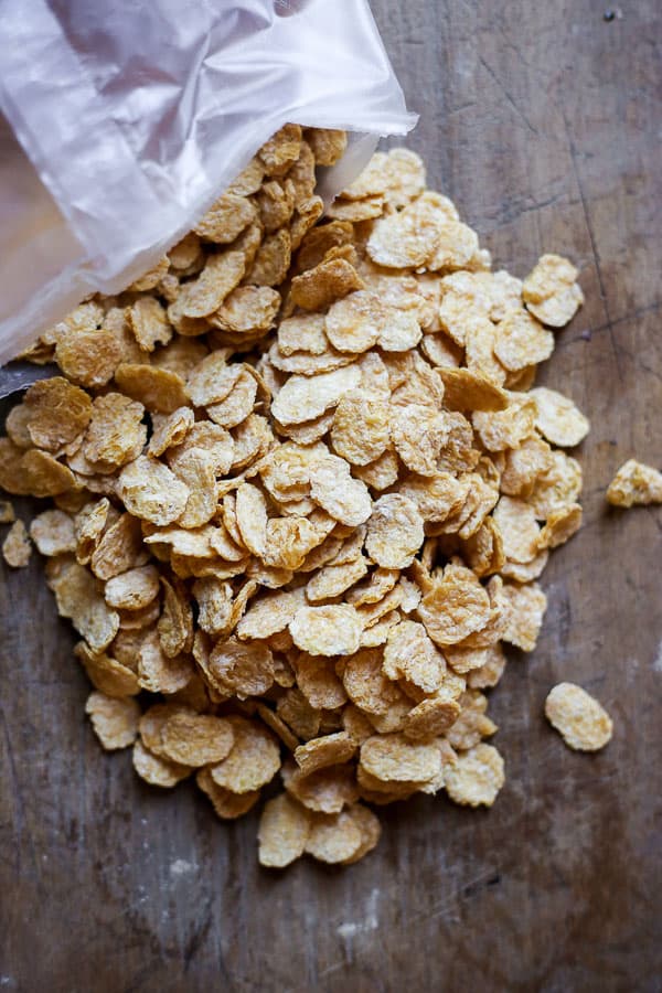 gluten-free cornflakes spilling out of a packet