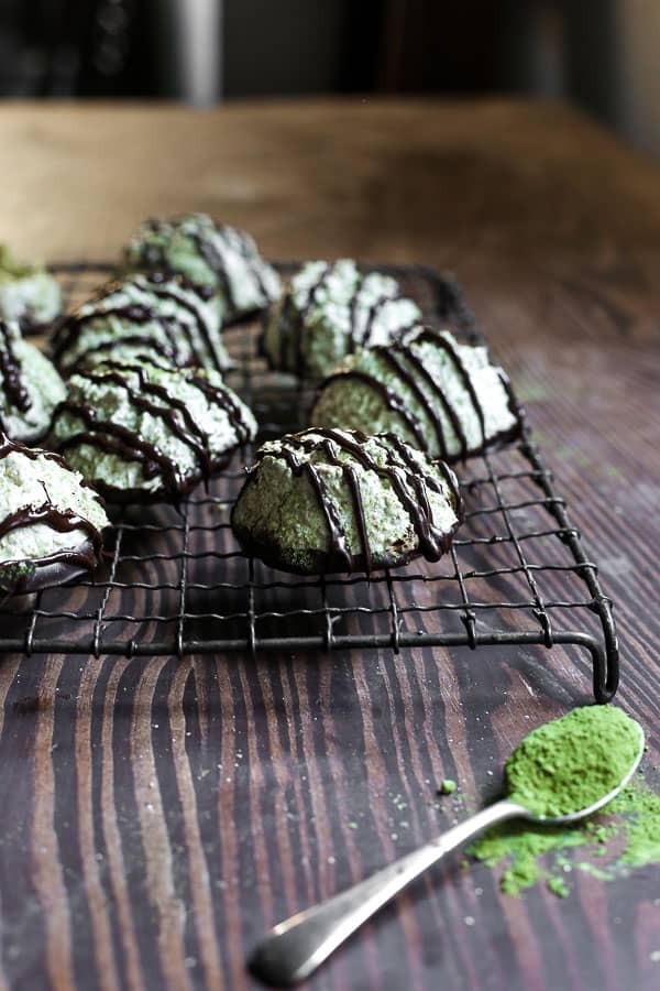 Coconut Matcha Macaroons on a wire rack