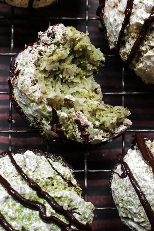 close up of Coconut Matcha Macaroons on a wire rack