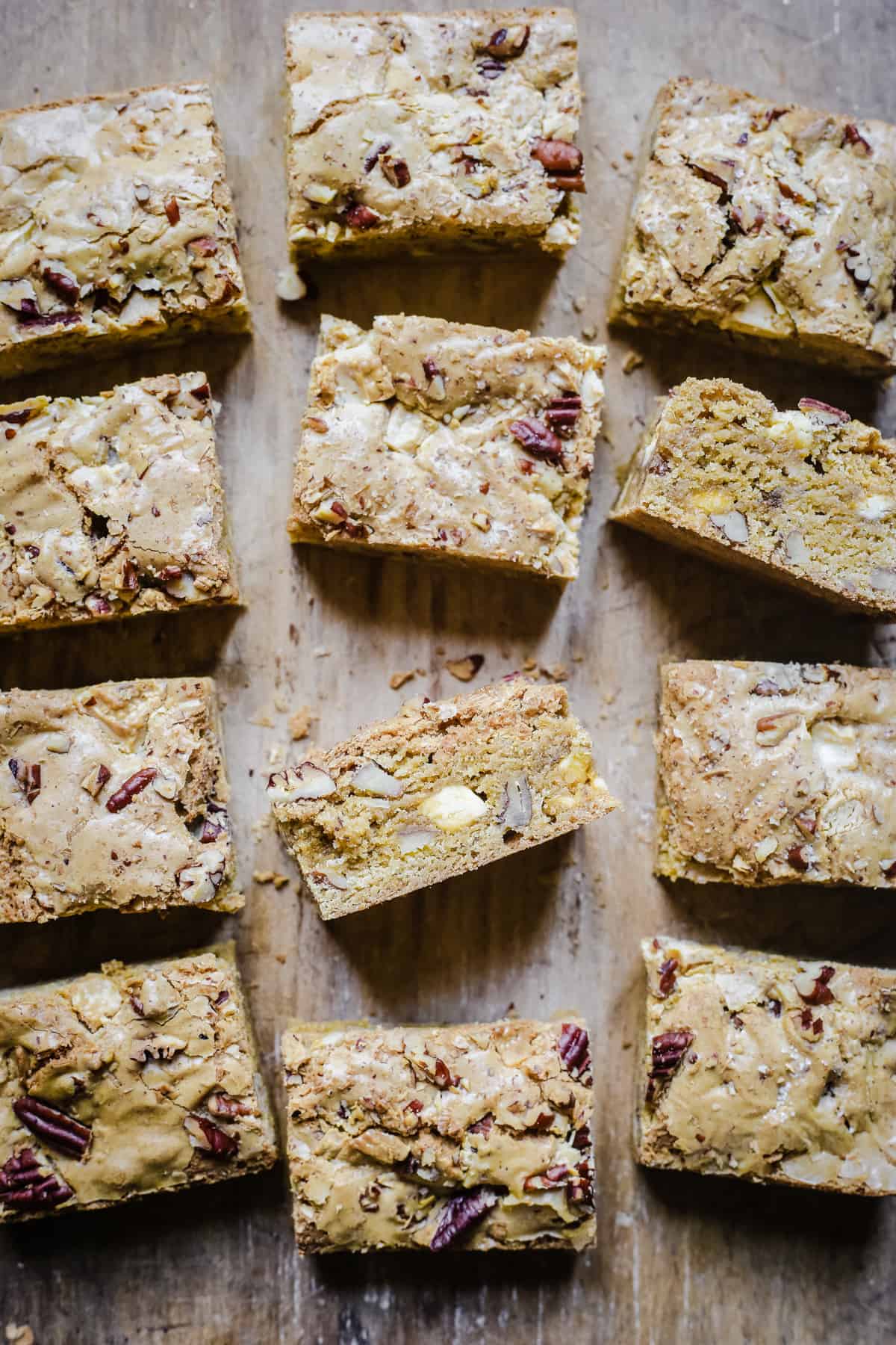 overhead of gluten-free blondies on a wooden board