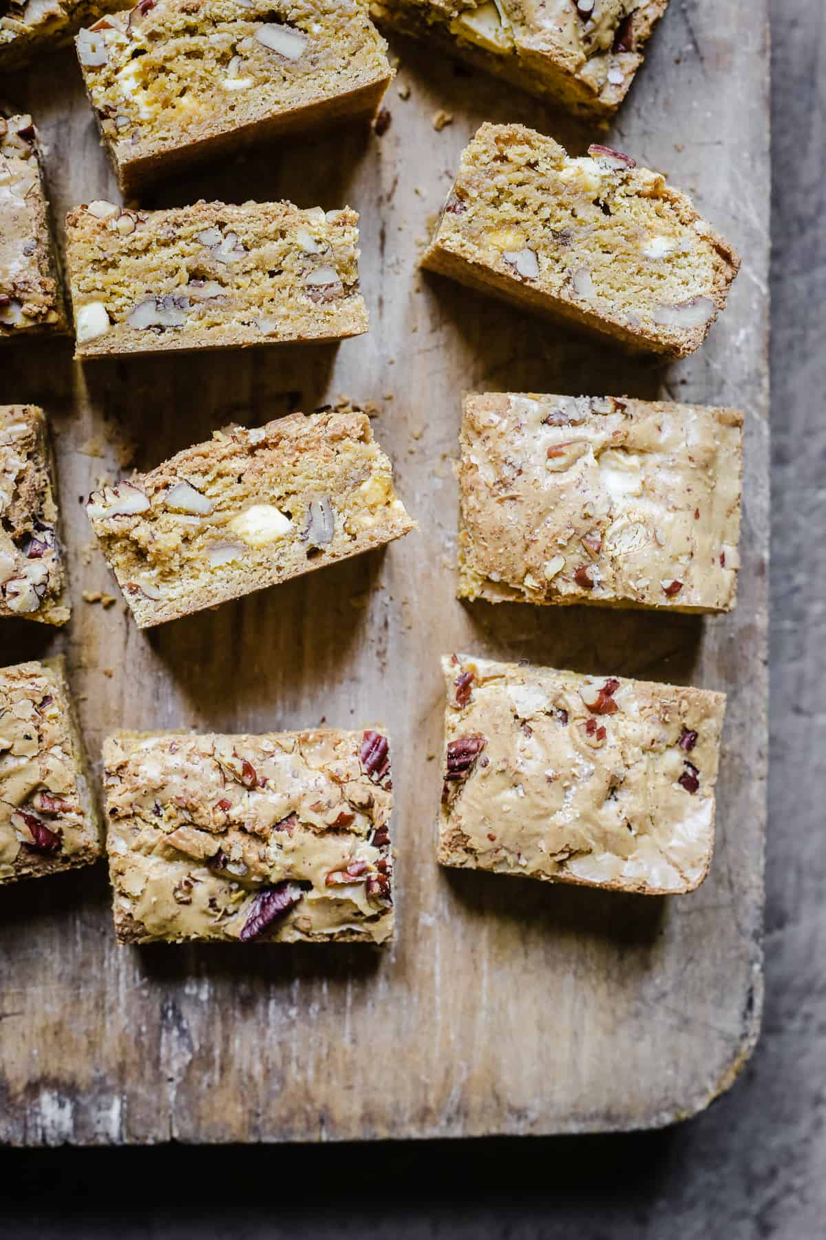 overhead of gluten-free blondies on a wooden board