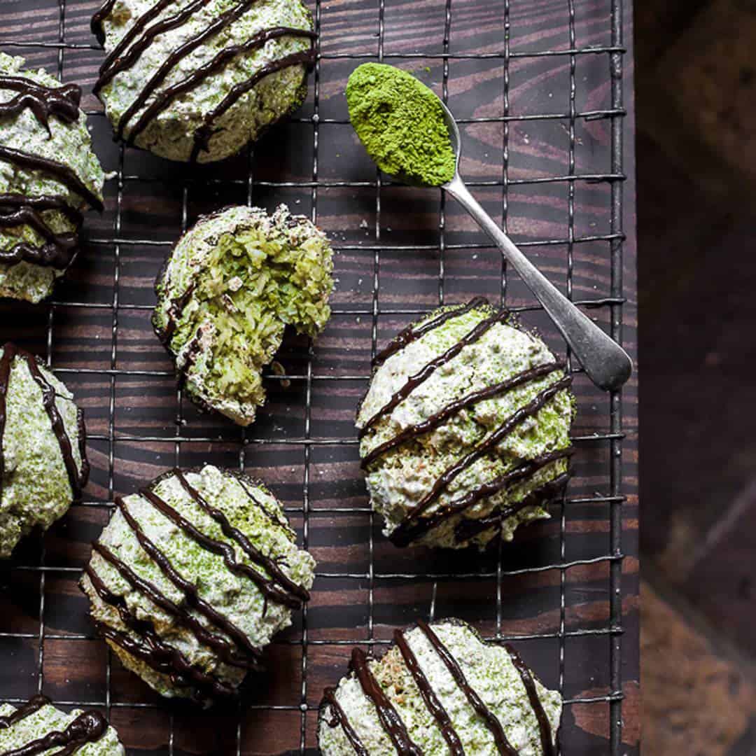 Coconut Matcha Macaroons on a wire rack