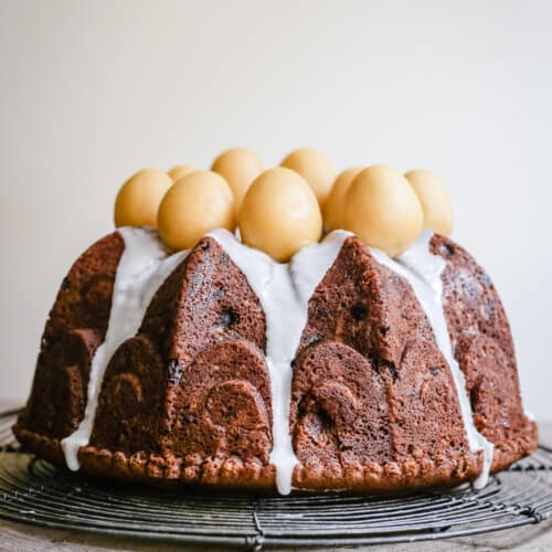 Simnel Cake on a wire rack on a wooden board