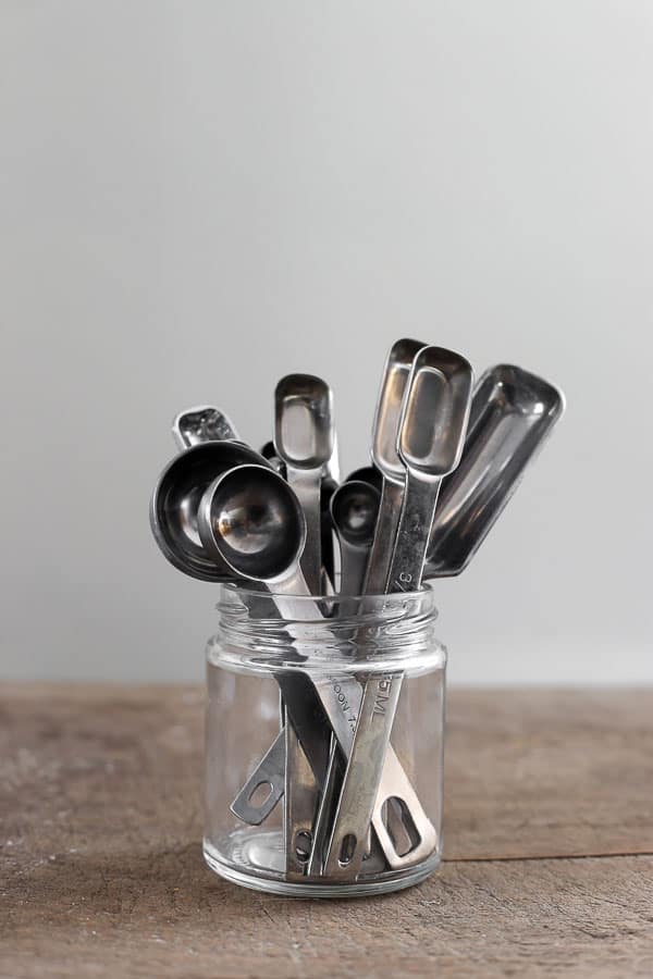 measuring spoons in a glass jar