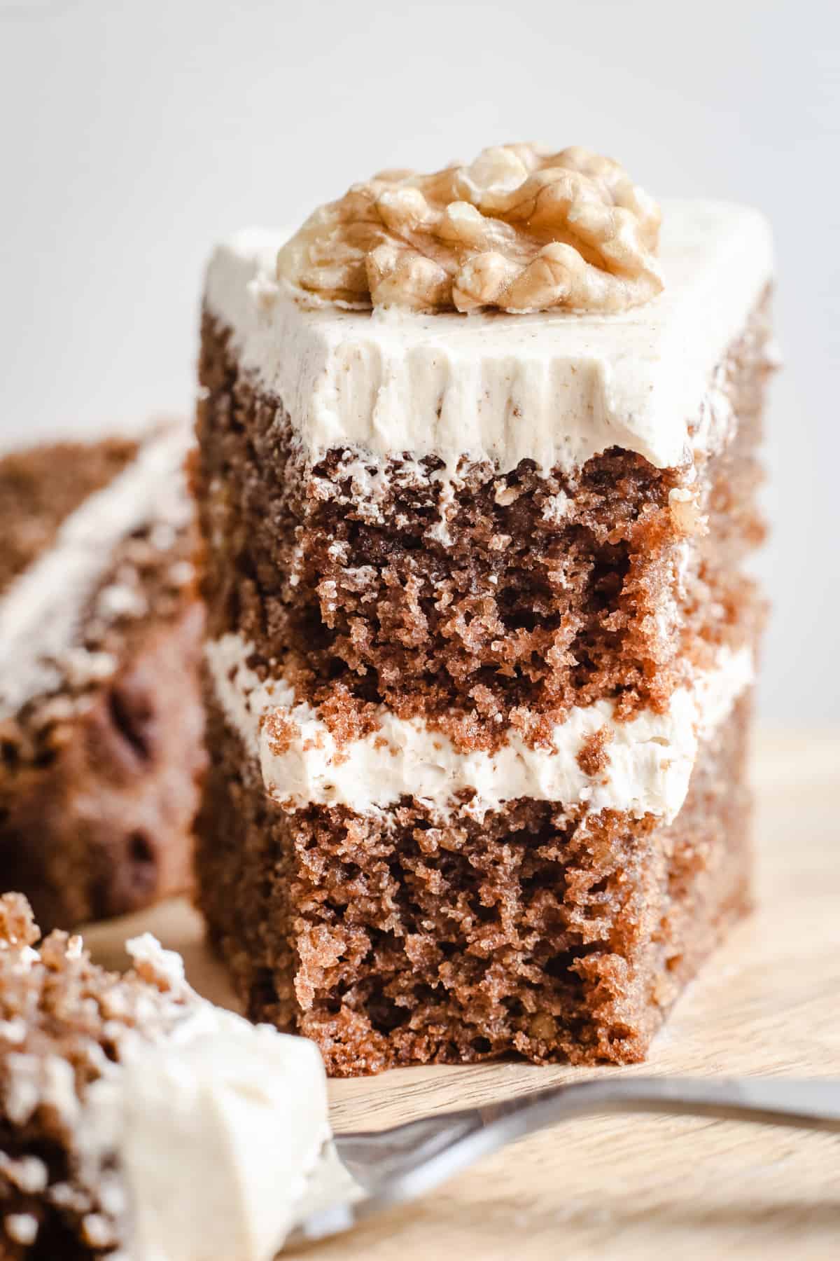 Cut slice of a gluten-free Coffee and Walnut Cake