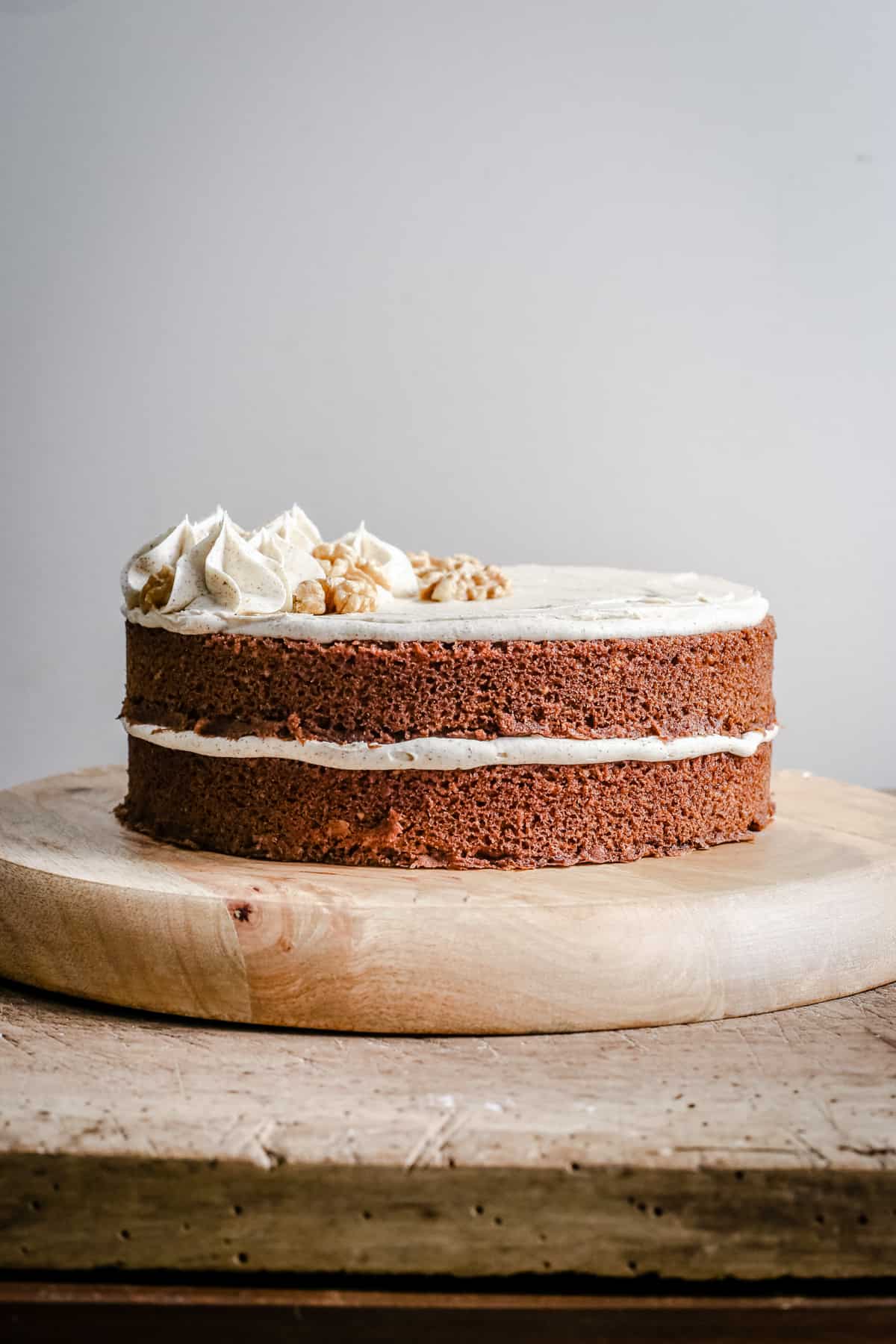 gluten-free Coffee and Walnut Cake on a wooden board