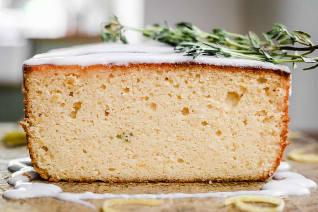 close up of a cut slice of whole lemon cake