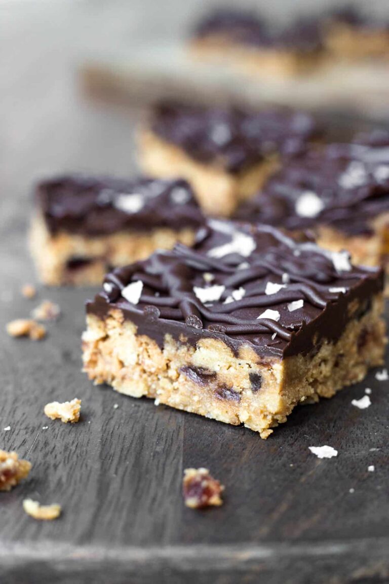 Close up of Chocolate Tiffin Bar on a wooden board