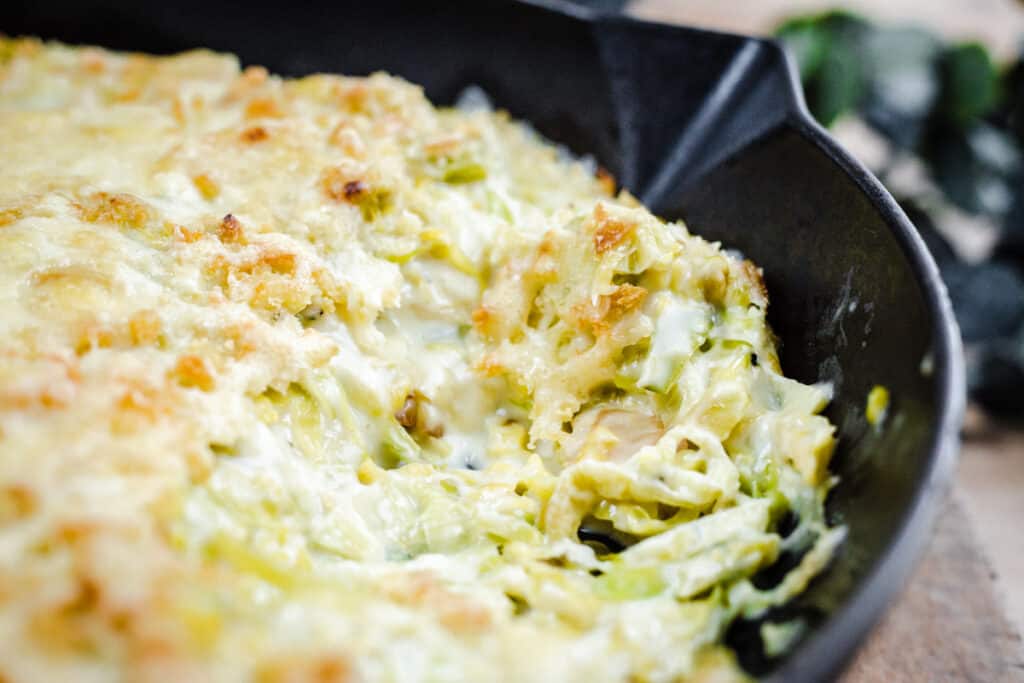 Close up of Brussel Sprout and Leek Gratin in a saucepan