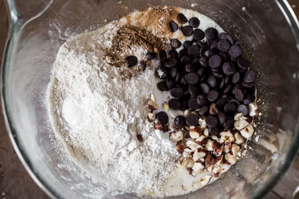 ingredients for Gluten-Free Banana Chocolate Chip Muffins in a mixing bowl