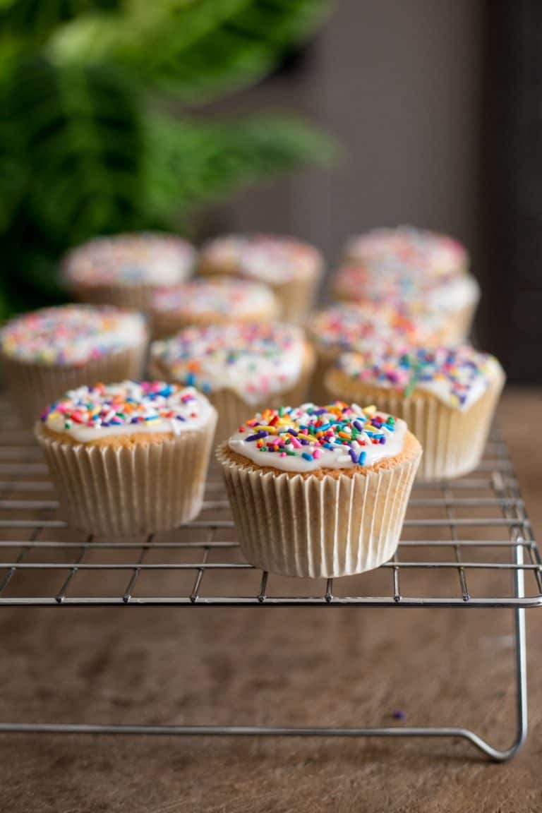 fairy cakes on a cooling rack