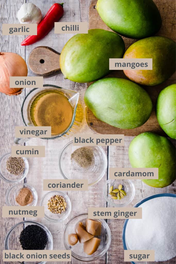 ingredients for mango chutney on a wooden board