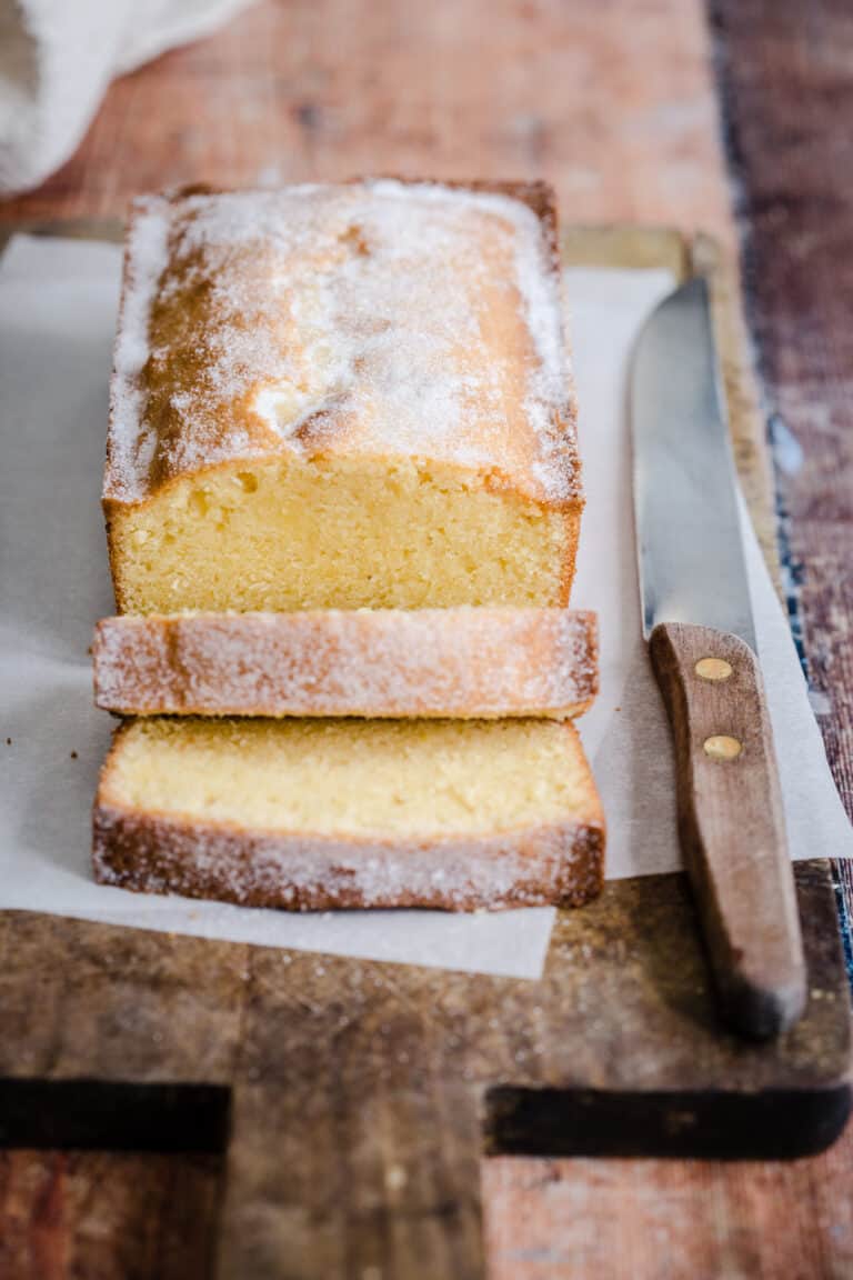 Sliced Rice Flour Madeira Cake next to knife