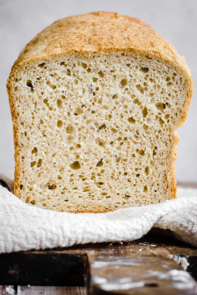 gluten free bread on a cloth on a wooden board
