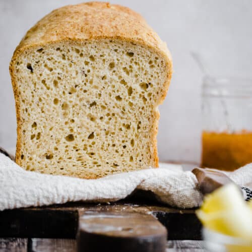 gluten free bread on a cloth on a wooden board