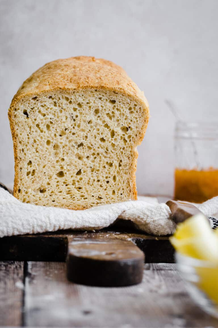 gluten free bread on a cloth on a wooden board