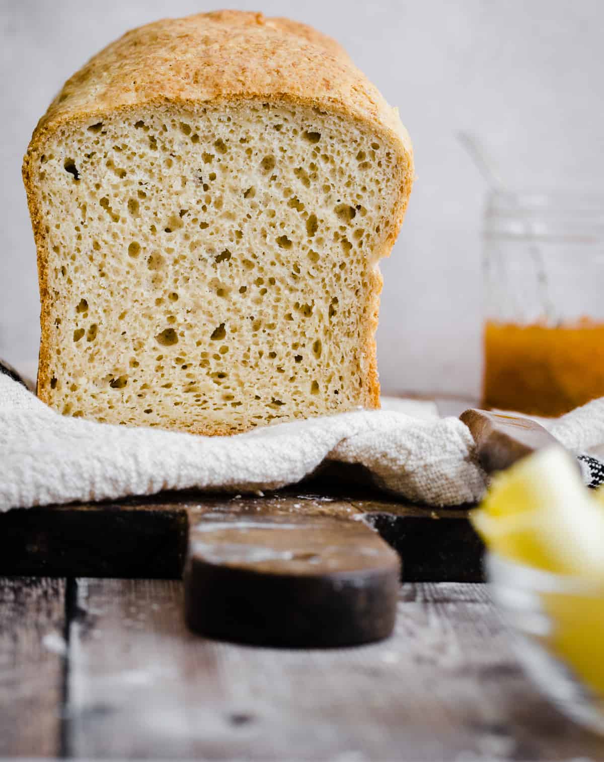 gluten free bread on a cloth on a wooden board