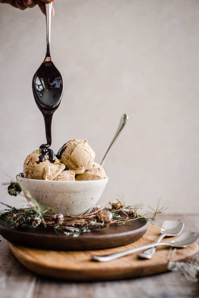 gingerbread ice cream in a bowl with treacle poured on top