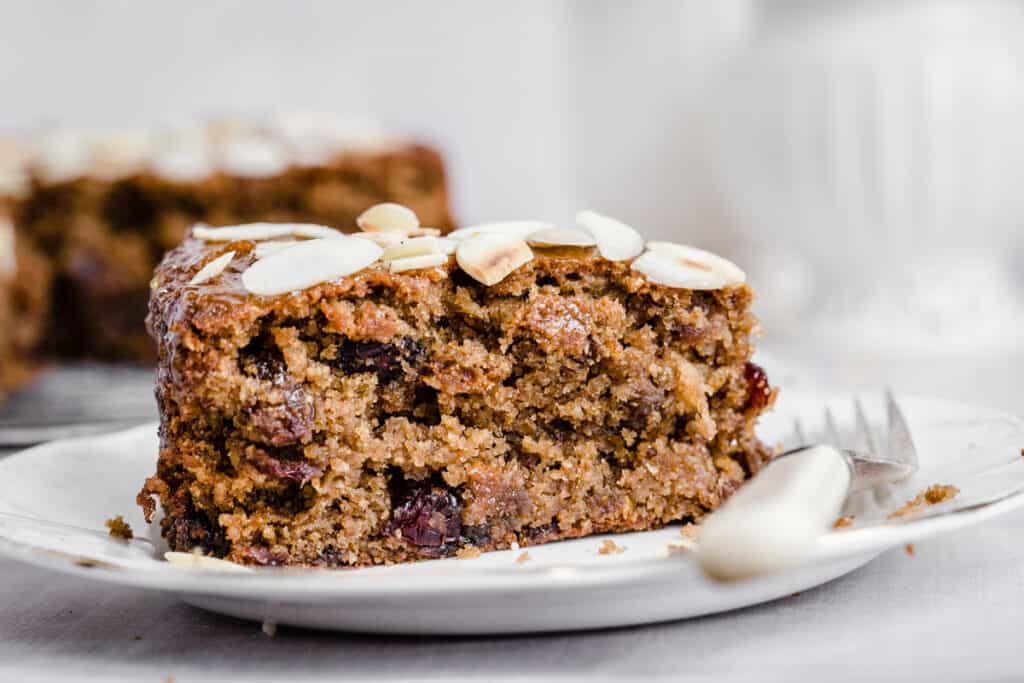 Bramley Apple Fruit Cake on a plate with a fork