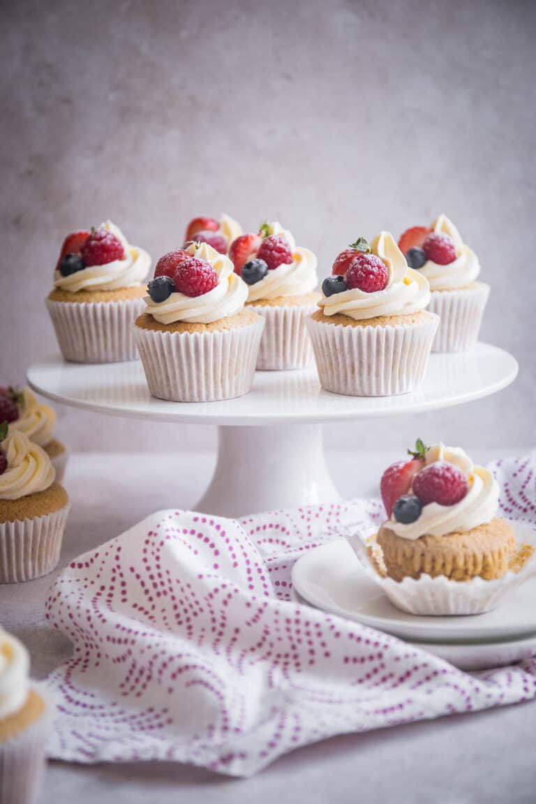 gluten free vanilla cupcakes on stand