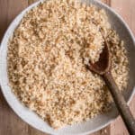 Gluten Free Breadcrumbs in bowl with wooden spoon