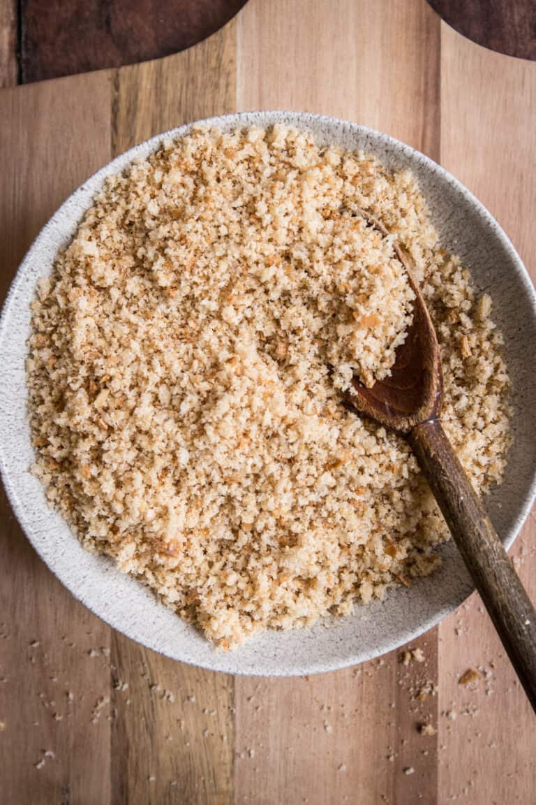 Gluten Free Breadcrumbs in bowl with wooden spoon